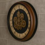 Beige Wall Clock With Black Roman Dial Golden Moving Gears And Brown Rim