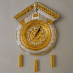 Cuckoo Wall Clock with Golden Weights in White and Silver Color