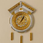 Cuckoo Wall Clock with Golden Weights in White and Silver Color