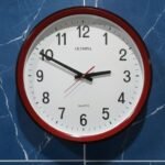Classic OLYMPIA Red Rim Wall Clock
