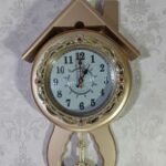 Gold House Shape Pendulum Wall Clock